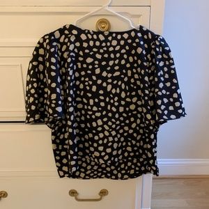 Cropped, open back blouse